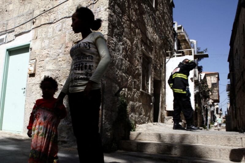 articles/2012/09/21/on-african-refugees-and-jewish-heartlessness/eritrean-woman-in-jerusalem-openz_afakx3