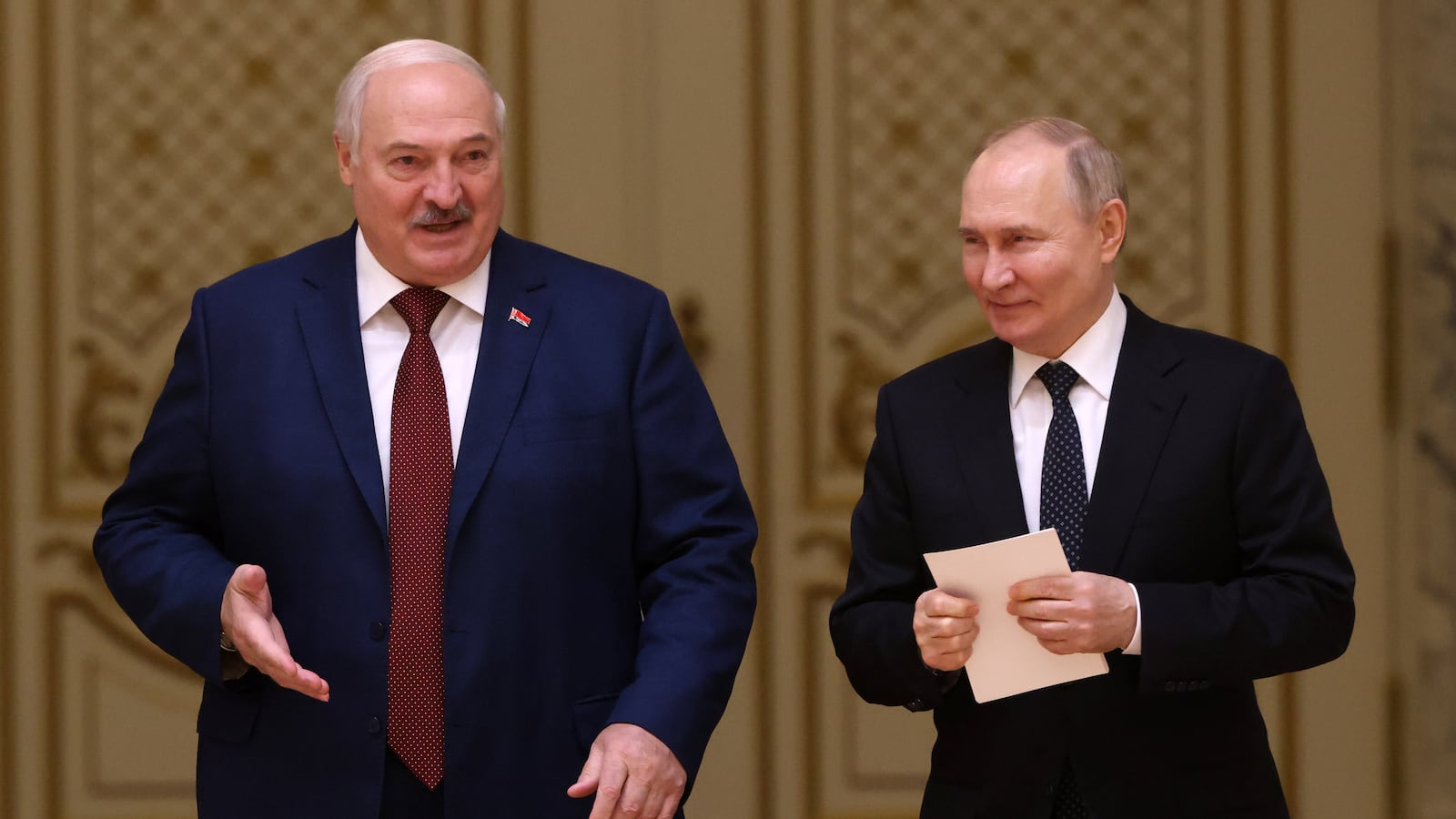 Russian President Vladimir Putin and Belarussian President Alexander Lukashenko enter the hall during their meeting at the Palace of Independence, on May 24, 2024, in Minsk, Belarus.