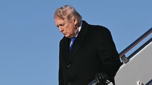 US President Donald Trump disembarks from Air Force One upon arrival at Joint Base Andrews in Maryland, March 23, 2026. Trump is returning to the White House after participating in the Memphis Safe Task Force Roundtable. (Photo by SAUL LOEB / AFP via Getty Images)
