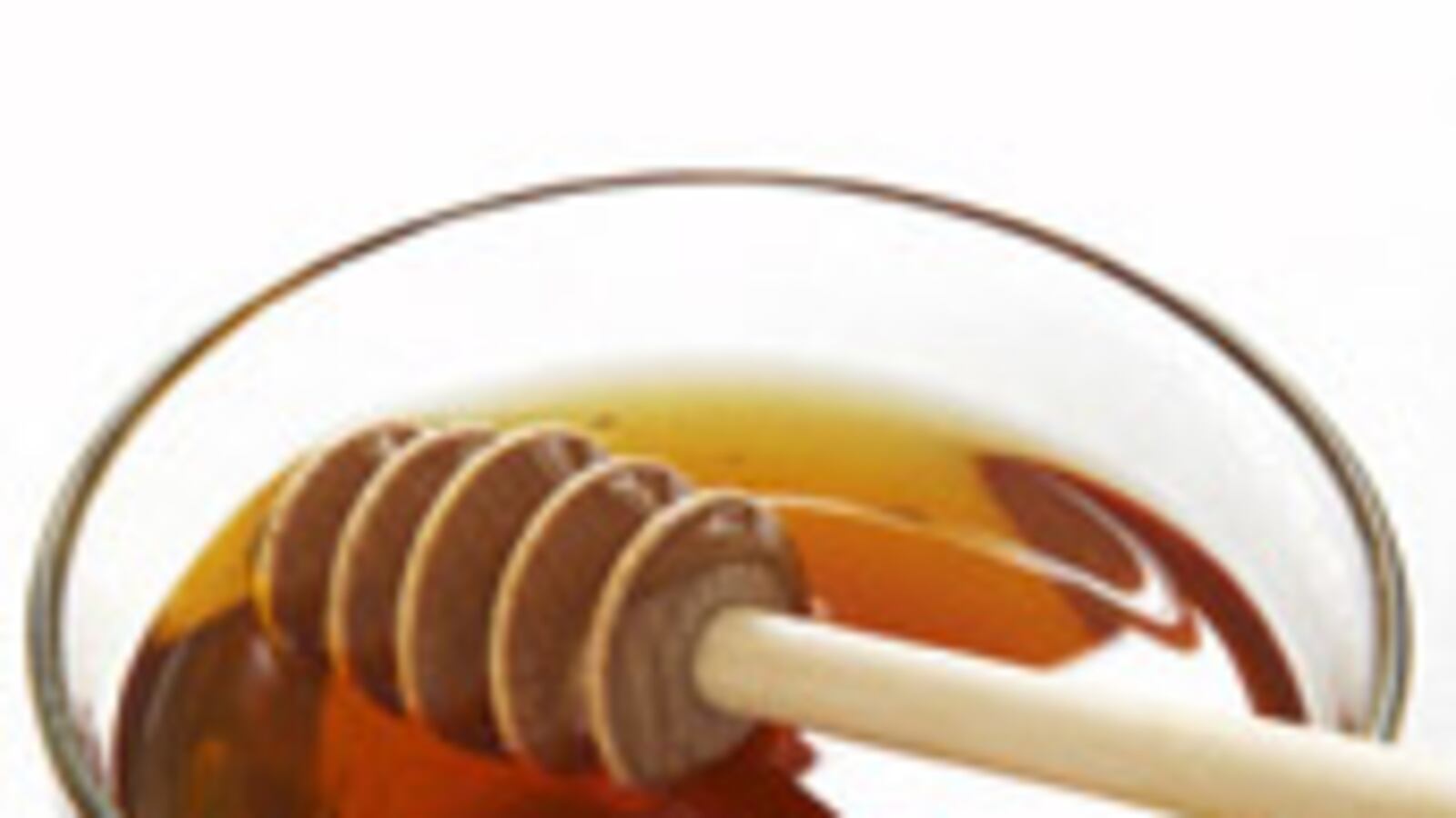 articles/2009/09/15/the-caviar-of-condiments-under-threat/workman-honey_49819_hwemsm