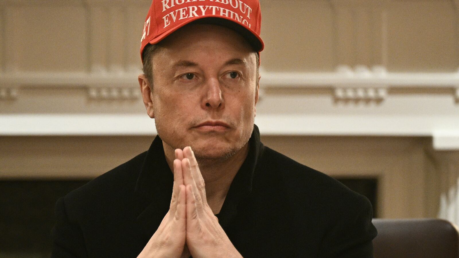 Elon Musk looks on as US President Donald Trump hosts a cabinet meeting in the Cabinet Room of the White House on March 24, 2025, in Washington, DC. (Photo by Brendan SMIALOWSKI / AFP) (Photo by BRENDAN SMIALOWSKI/AFP via Getty Images)