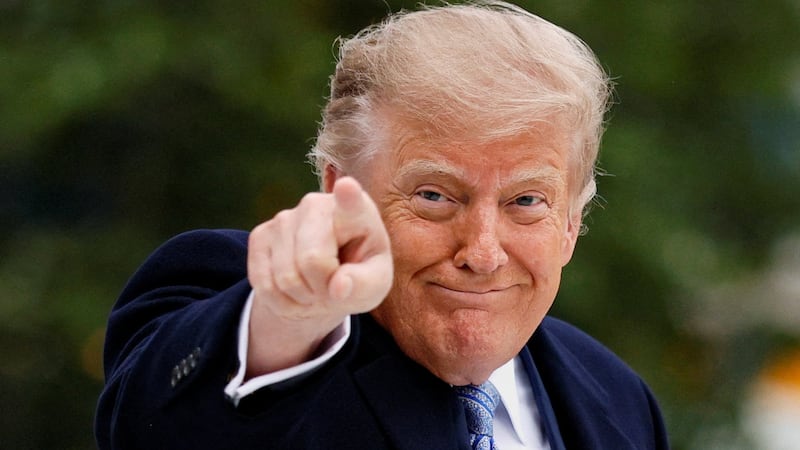 President Donald Trump points a finger before boarding Marine One to travel to Joint Base Andrews to greet Chinese President Xi Jinping, on the South Lawn of the White House in Washington, DC, US, September 23, 2026.