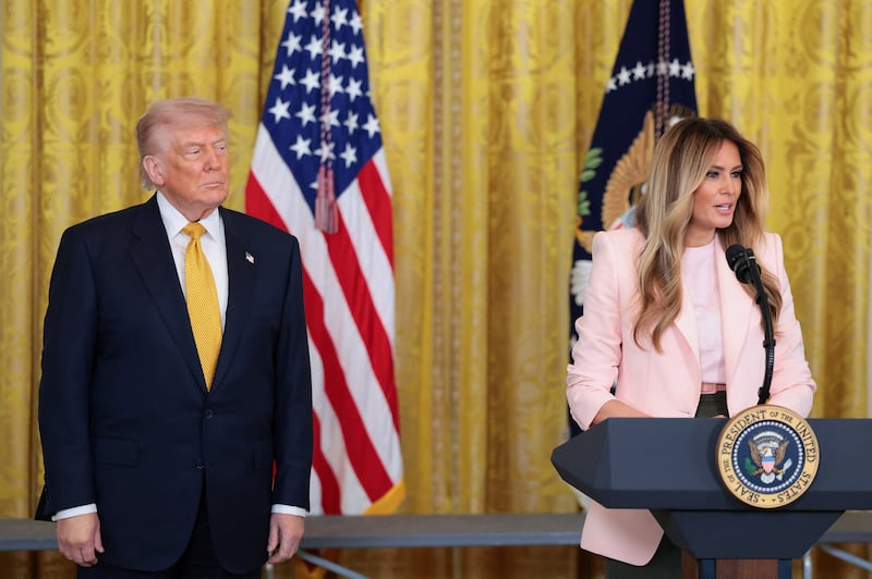 U.S. first lady Melania Trump speaks alongside President Donald Trump, during an event to mark Military Mother's Day, in the East Room at the White House in Washington, D.C., U.S., May 6, 2026.