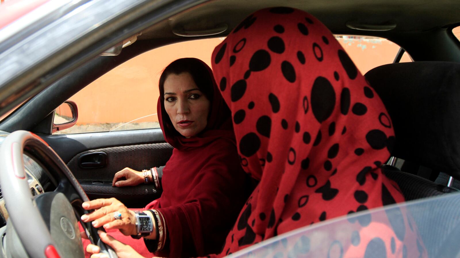 cheats/2012/05/20/afghan-woman-wants-driving-rights/afghanistan-driving-school-women-shakila-naderi-cheat_lbvqwk
