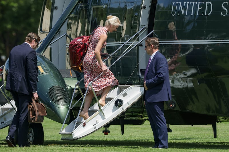 WASHINGTON, DC - AUGUST 04: Executive assistant to U.S. President Donald Trump Natalie Harp boards Marine One en route to Joint Base Andrews from the Ellipse near the White House on August 04, 2026 in Washington, DC. Trump is traveling to Los Angeles to attend a RNC fund raising event and then onto Las Vegas for a rally on August 5th.  (Photo by Alex Wong/Getty Images)