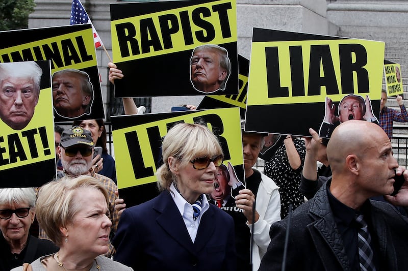 E. Jean Carroll (C) departs Manhattan federal appeals court following arguments in a judgement appeal brought by former US President Donald Trump, in New York City, September 6, 2024. Former US President Donald Trump was ordered on January 26, 2024 by a New York jury to pay $83 million in damages to Carroll, whom he publicly insulted and called a liar for alleging that he sexually assaulted her. The jury reached its decision after slightly less than three hours of deliberations. Trump made multiple comments about Carroll while he was president, demeaning her in the wake of her allegation of a 1990s assault. (Photo by Leonardo Munoz / AFP) (Photo by LEONARDO MUNOZ/AFP via Getty Images)