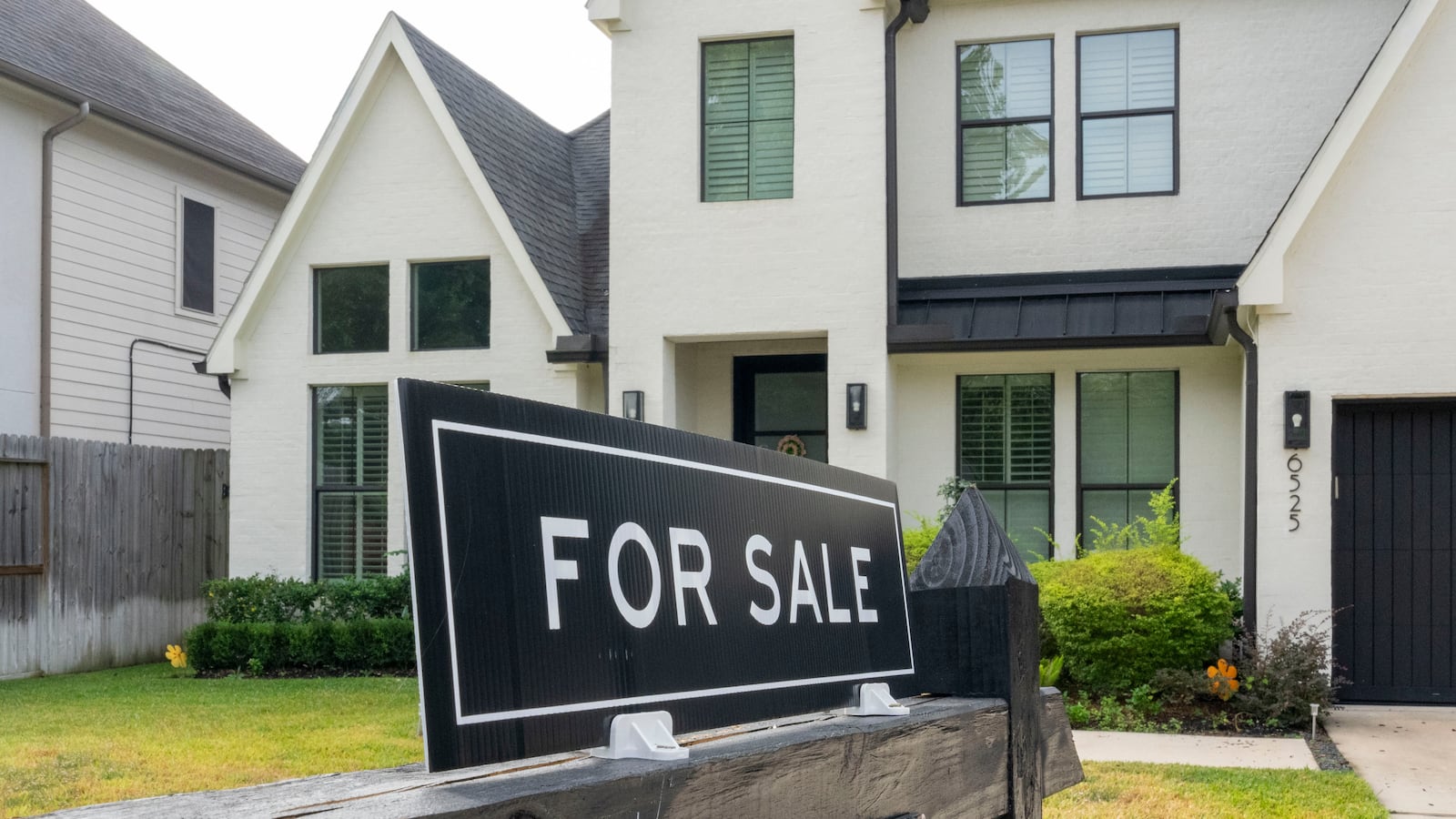 A for sale sign is seen in front of a house in a Spring Branch neighborhood in Houston, Monday, Oct. 27, 2025.