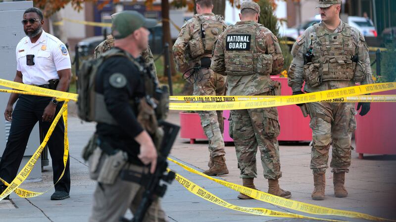WASHINGTON, DC - NOVEMBER 26: Members of law enforcement and National Guard soldiers respond to a shooting near the White House on November 26, 2025 in Washington, DC. At least two National Guard soldiers have been shot blocks from the White House. (Photo by Chip Somodevilla/Getty Images)