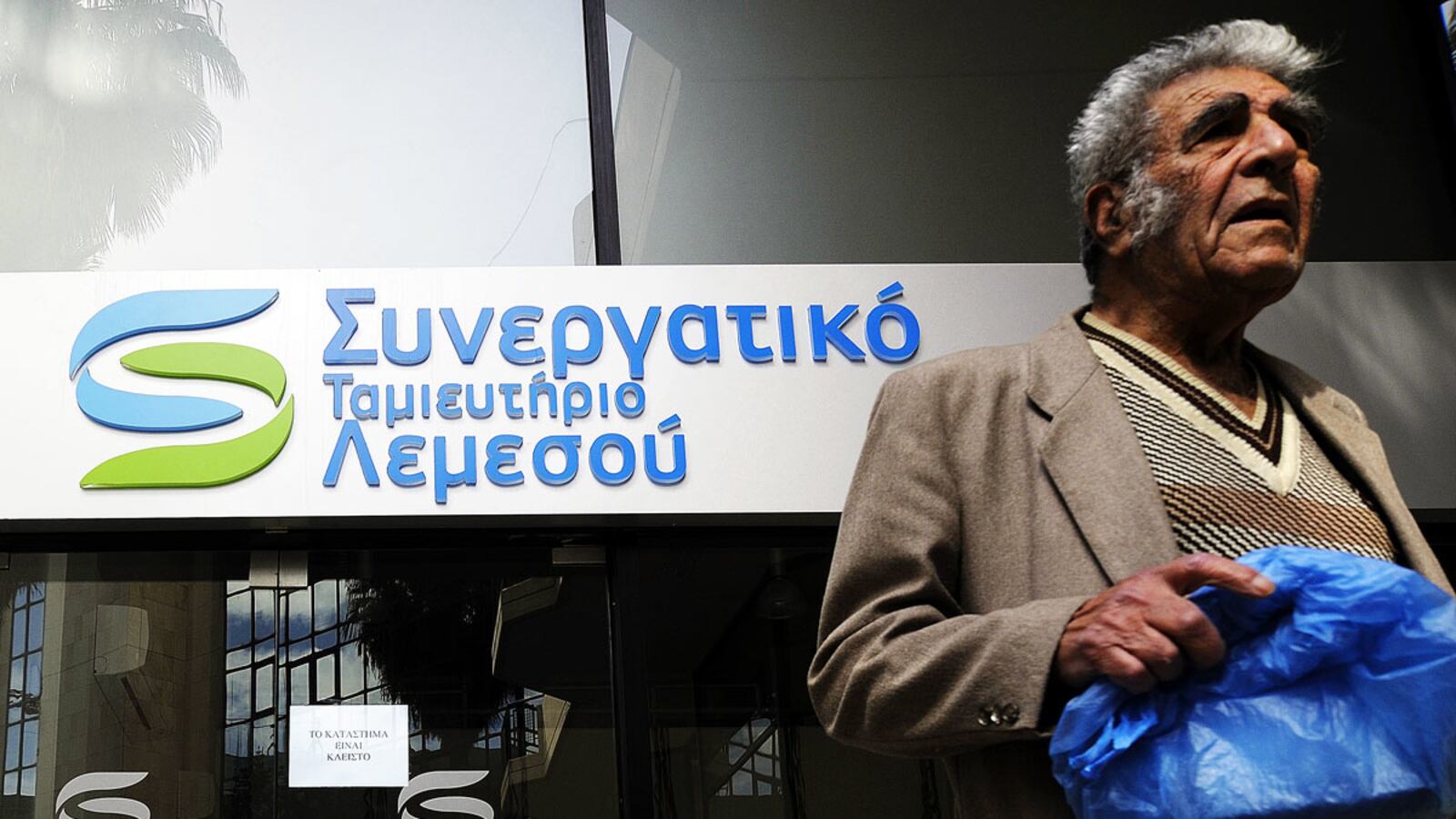 cheats/2013/03/17/cyrus-delays-bailout-debate/130317-Cyprus-bank-cheat_wxfszc