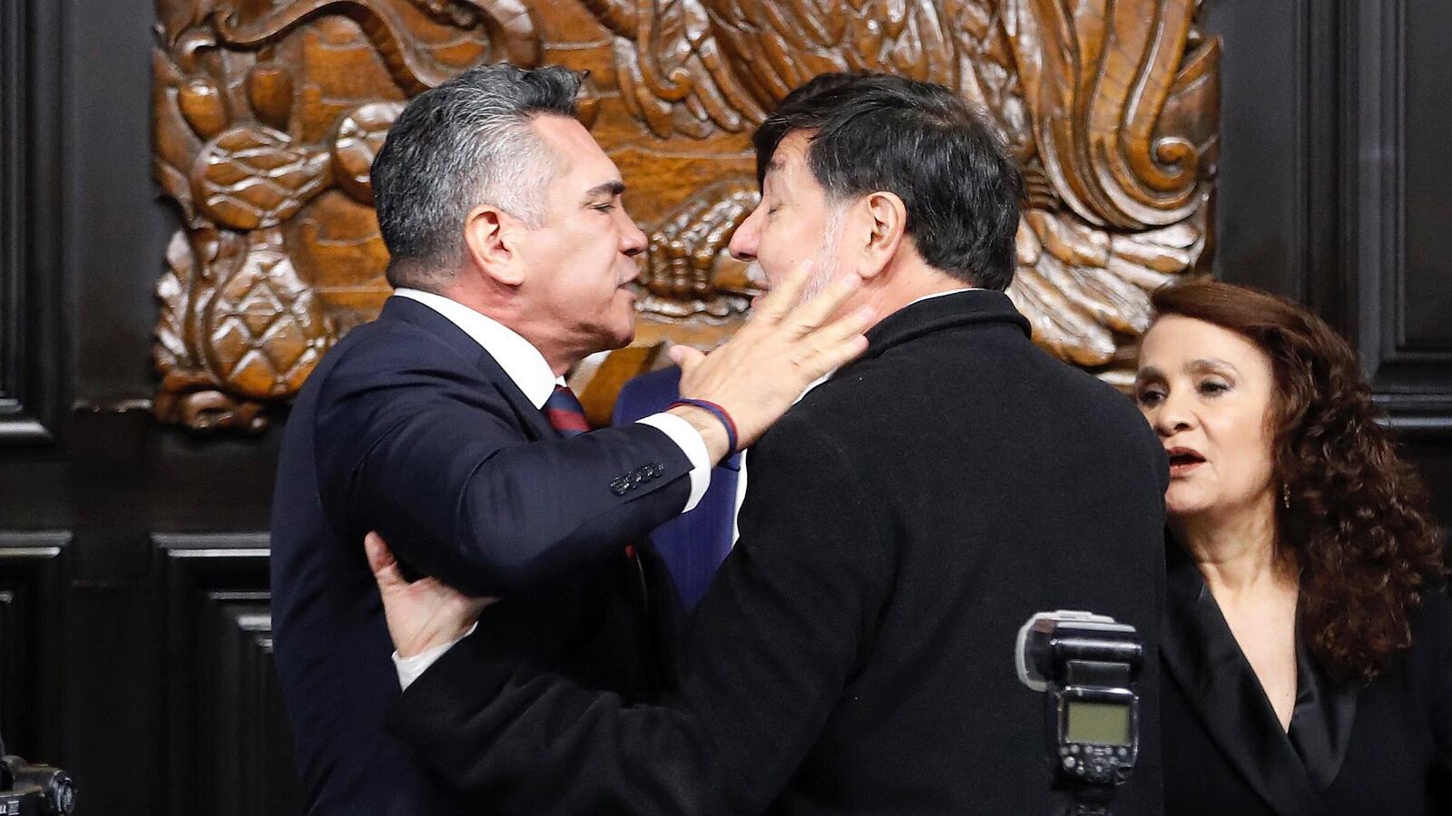 Senator Alejandro Moreno (L) of the Institutional Revolutionary Party (PRI) scuffles with Senator Gerardo Fernandez Norona of the National Regeneration Movement Party (Morena) during a session of the Permanent Commission of the Senate in Mexico City on August 27, 2025. Mexican senators came to blows on Wednesday following a heated debate over alleged calls from the opposition for the United States to intervene militarily against drug cartels. (Photo by AFP) (Photo by STRINGER/AFP via Getty Images)