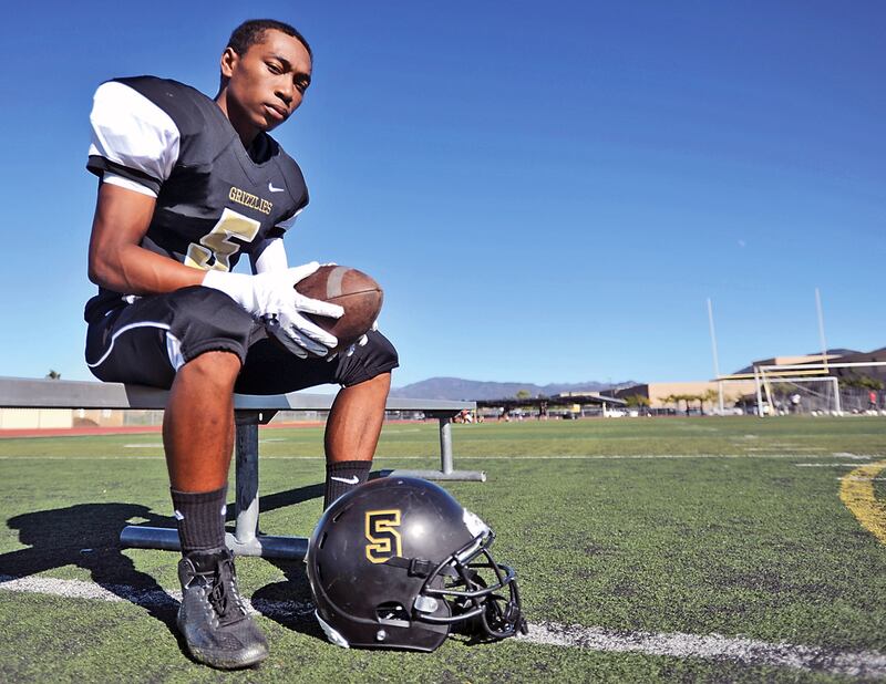 Shane Tamura, photographed in 2014, was a standout high school football player in Santa Clarita, California, but never played college ball.