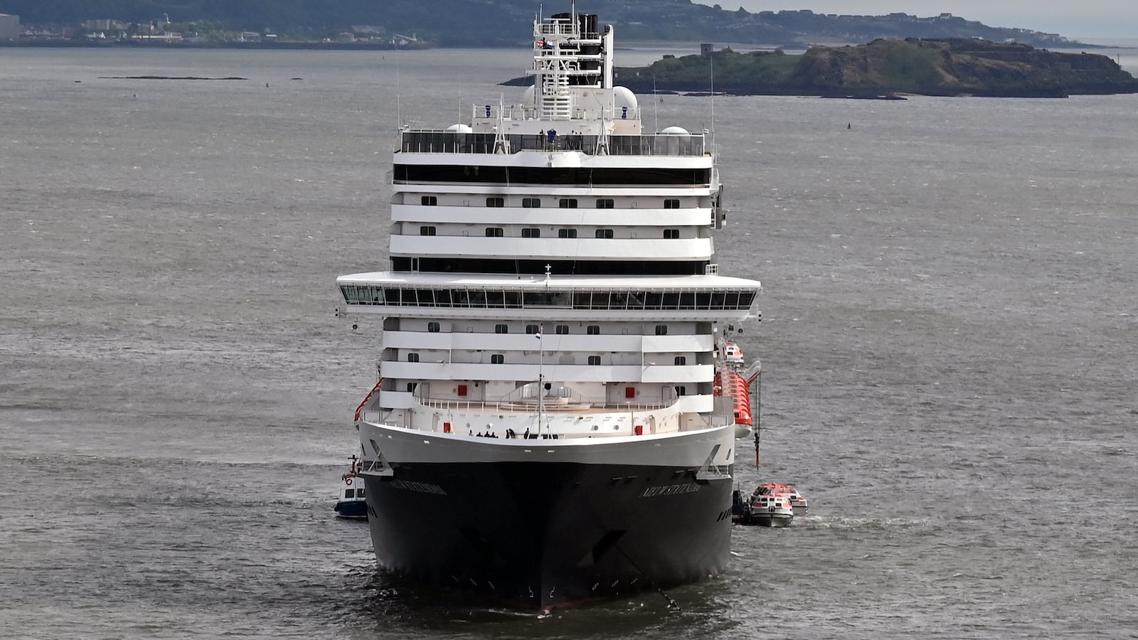 The Holland America Line cruise ship Nieuw Statendam at anchor in the Firth of Forth near the Forth Bridge, on May 29, 2025 in South Queensferry, Scotland, United Kingdom.