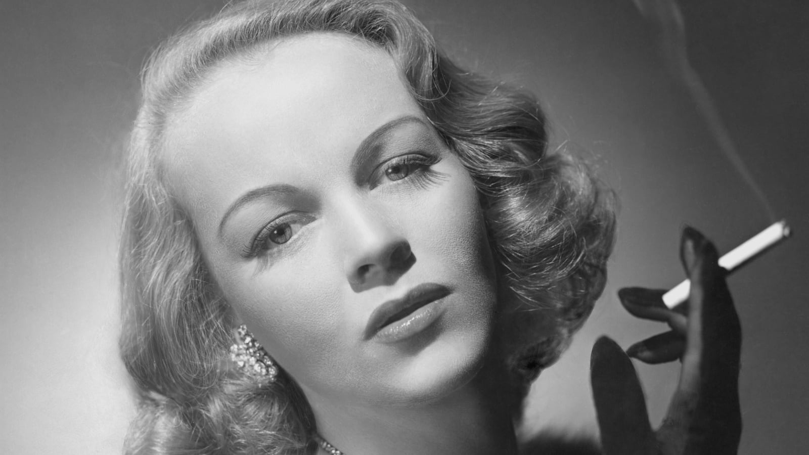 Actress Maria Riva pictured smoking a cigarette.