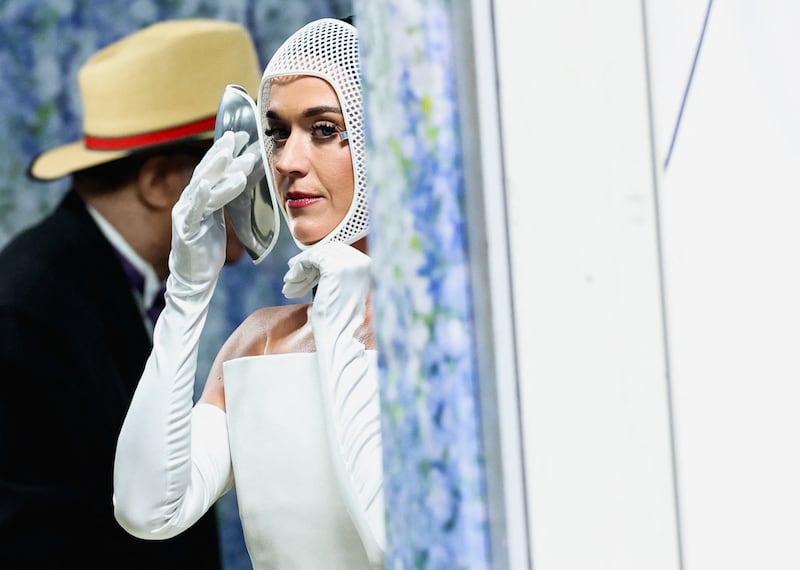 Katy Perry poses during the Met Gala, an annual fundraising gala held for the benefit of the Metropolitan Museum of Art's Costume Institute with this year's theme 'Costume Art' in New York City, New York, U.S., May 4, 2026. REUTERS/Brendan Mcdermid
