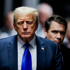 Former U.S. President Donald Trump departs the courtroom after being found guilty on all 34 counts in his hush money trial at Manhattan Criminal Court on May 30, 2024 in New York City.