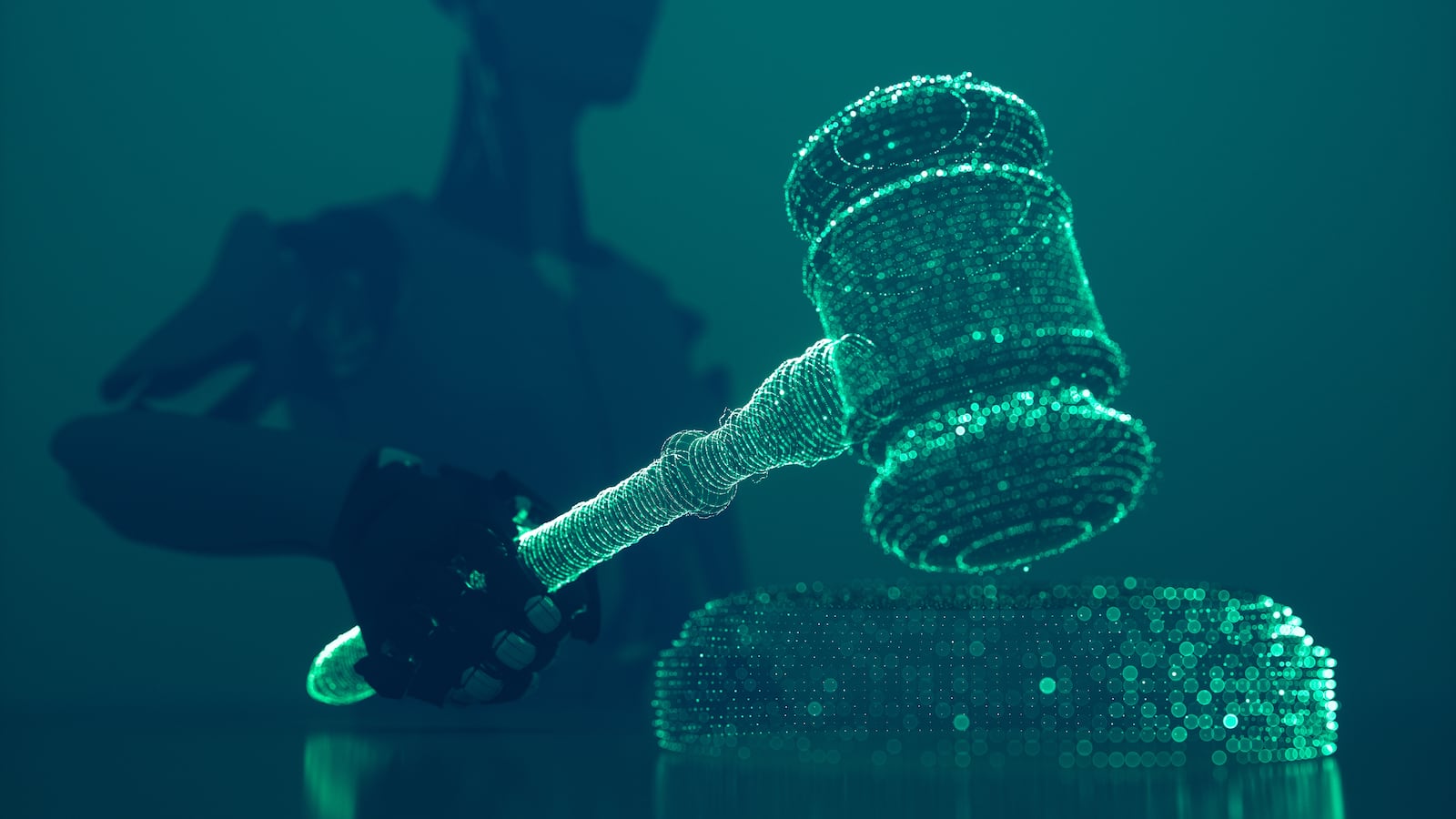 Robot hand holding gavel