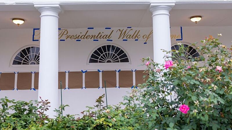 WASHINGTON, DC - SEPTEMBER 21: A banner reading "Presidential Walk of Fame' is seen along the colonnade of the Rose Garden at the White House on September 21, 2025 in Washington, DC. President Trump will travel to Arizona to pay tribute to conservative activist Charlie Kirk at a memorial and return to the White House this evening. (Photo by Tasos Katopodis/Getty Images)