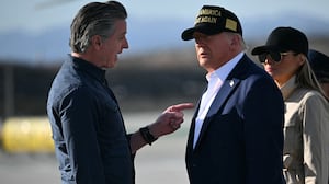 Donald Trump and First Lady Melania Trump are greeted by California Governor Gavin Newsom upon arrival at Los Angeles International Airport in Los Angeles, California, on January 24, 2025.