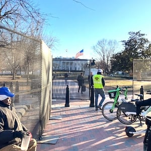 Fences are erected at the edge of Lafayette Square.