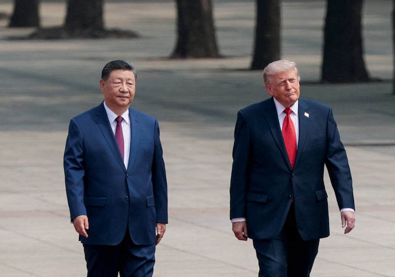U.S. President Donald Trump participates in a welcome ceremony with Chinese President Xi Jinping at the Great Hall of the People in Beijing, China, May 14, 2026.