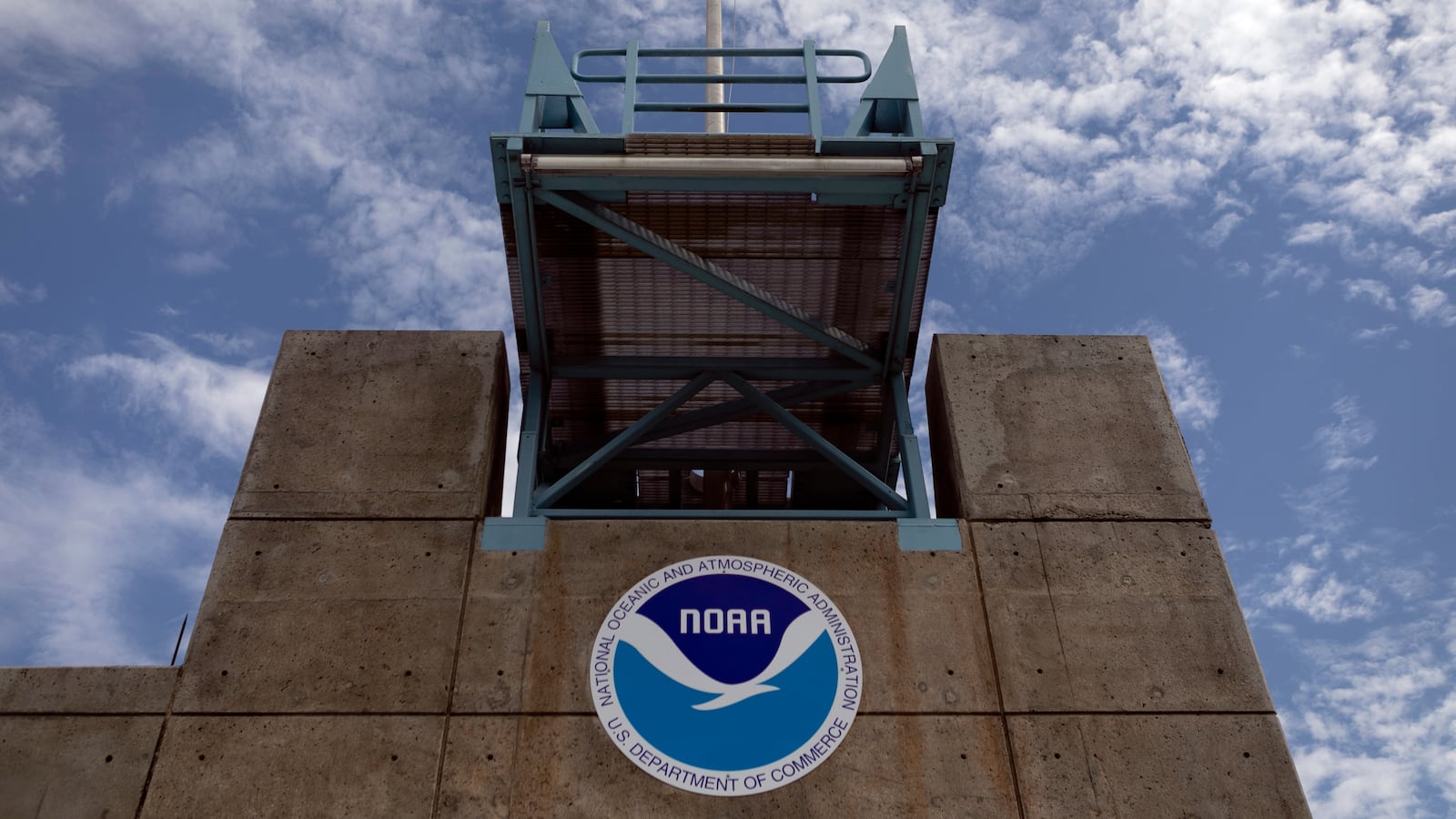 The National Oceanic and Atmospheric Administration is demanding money from employees it fired, rehired, then fired again.