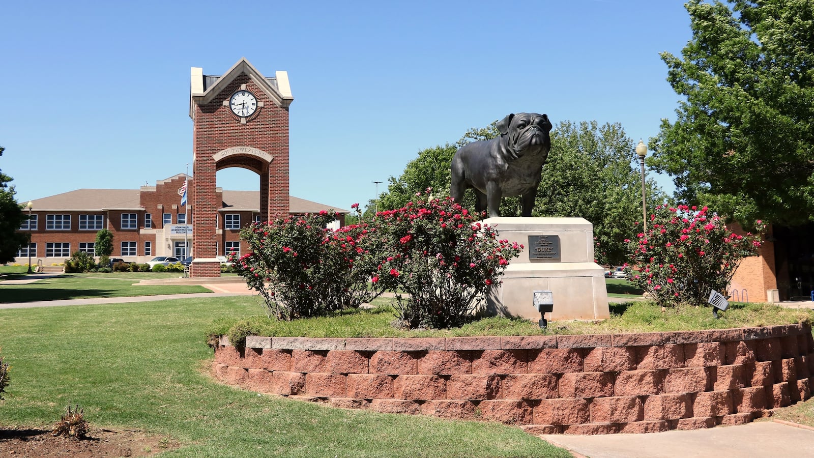 Southwestern Oklahoma State University campus scene in Weatherford Oklahoma, showing the Centennial Clock Tower and Duke the Bulldog mascot statue. Southwestern Oklahoma State University is a public institution of higher education in Weatherford, Oklahoma in southwestern Oklahoma. Established in 1901, the university enrolls about 4500 undergraduate and graduate students. (Photo by: Don and Melinda Crawford/UCG/Universal Images Group via Getty Images)