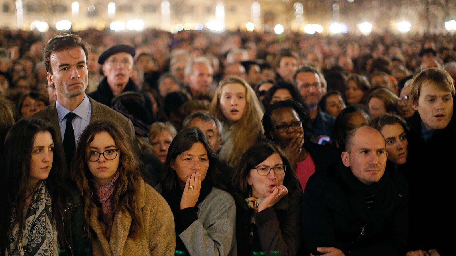 galleries/2015/11/15/parisians-gather-at-notre-dame-to-remember-victims-photos/151115-notredame-memorial1_nrou9i