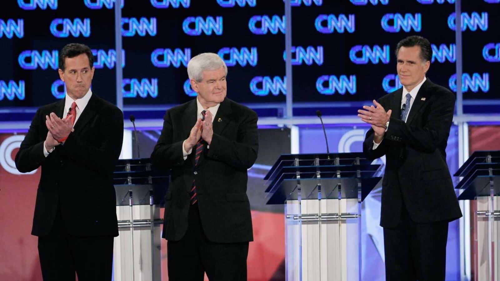 cheats/2012/01/26/romney-knocks-gingrich-on-immigration/gop-debate-begins-box_bgvwks