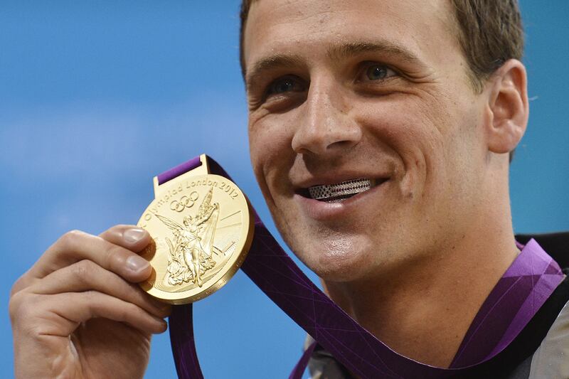 galleries/2012/07/29/ryan-lochte-olympic-fashion-speedos-bikinis-sneakerse-more-photos/ryan-lochte-fashion-grill_kiohyq