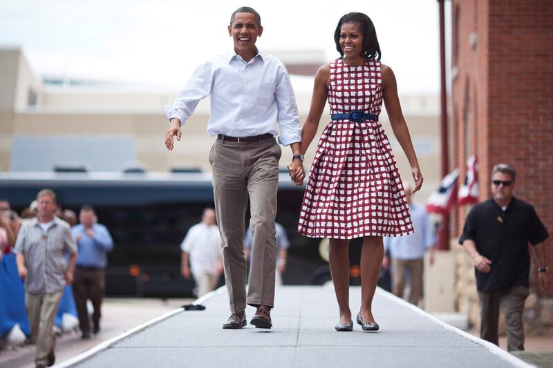 articles/2014/06/02/who-pays-for-michelle-obama-s-clothing-scout-willis-speaks-out-regarding-topless-photos/131230-stuart-obama-tease_ekqakk