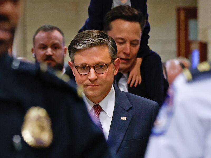 WASHINGTON, DC - DECEMBER 05: U.S. Speaker of the House Mike Johnson (R-LA) leads Tesla CEO Elon Musk, Co-Chair of the newly announced Department of Government Efficiency (DOGE) and Musk's son "X" to a meeting at the U.S. Capitol with members of the U.S. Congress December 05, 2024 in Washington, DC. Musk and DOGE Co-chair Vivek Ramaswamy are meeting with members of the U.S. Congress today about DOGE, a planned presidential advisory commission with the goal of cutting government spending and increasing efficiency in the federal workforce. (Photo by Anna Moneymaker/Getty Images)