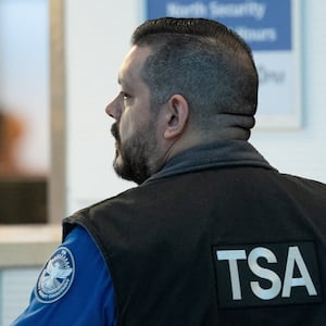 TSA agents have been hit especially hard by the latest government shutdown. (Photo by Aaron Schwartz / AFP via Getty Images).