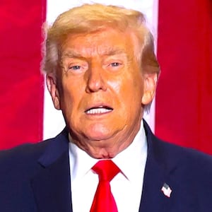 President Donald Trump arrives to deliver a speech on energy and the economy, in Clive, Iowa, U.S., January 27, 2026.