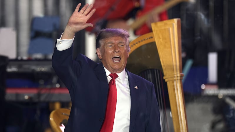 President Donald Trump waves to a crowd