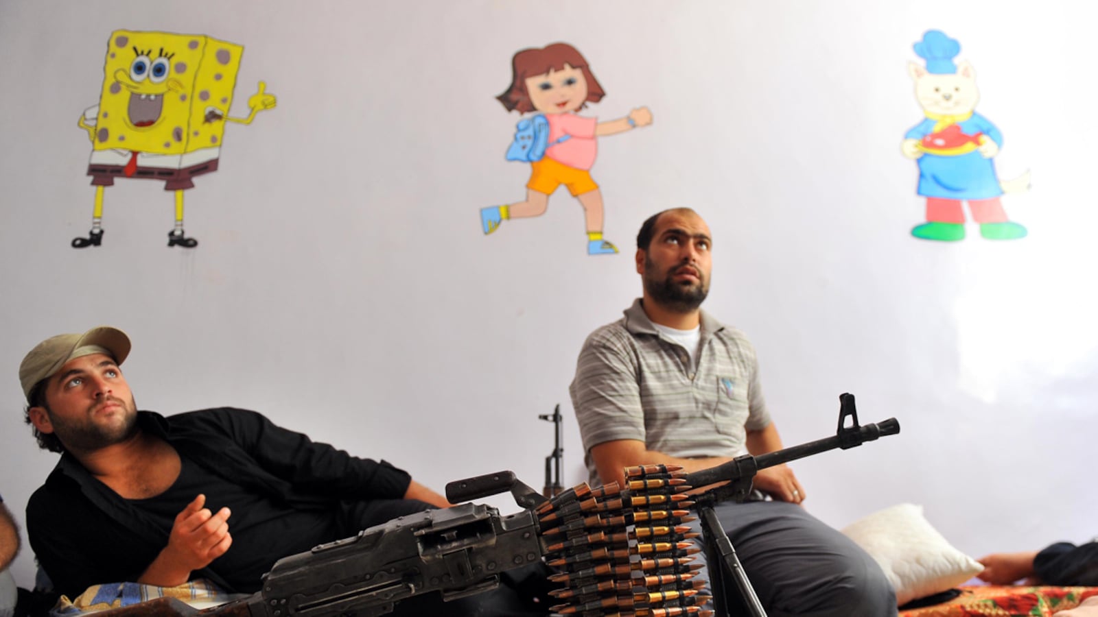 articles/2012/07/26/as-syrian-troops-pour-into-aleppo-rebels-warn-of-drawn-out-war/syrian-rebels-school-mcelroy_azgfdi