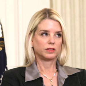 President Donald Trump, joined by Attorney General Pam Bondi