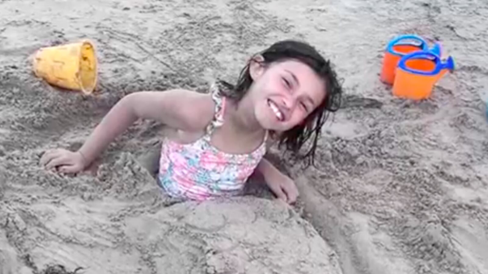 Harper Ochoa plays at the beach