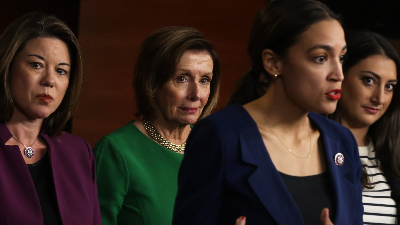 U.S. Rep. Alexandria Ocasio-Cortez (D-NY) speaks as Rep. Angie Craig (D-MN), Speaker of the House Rep. Nancy Pelosi (D-CA) and Rep. Sara Jacobs (D-CA) listen during a news conference at the U.S. Capitol June 16, 2021 in Washington, DC.