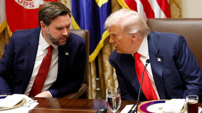 WASHINGTON, DC - OCTOBER 14: U.S. President Donald Trump speaks with U.S. Vice President JD Vance (L) during a meeting with President of Argentina Javier Milei in the Cabinet Room at the White House on October 14, 2025 in Washington, DC. Trump is hosting Milei for a working lunch days after the U.S. Treasury finalized a $20 billion currency swap framework with Argentina in an effort to help stabilize its economy. (Photo by Kevin Dietsch/Getty Images)