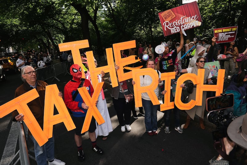 Demonstrators participate in a “Resistance Red Carpet” protest against the Met Gala, the star-studded fundraiser known for its extravagant fashion and high-profile guests, in New York City, U.S., May 4, 2026.