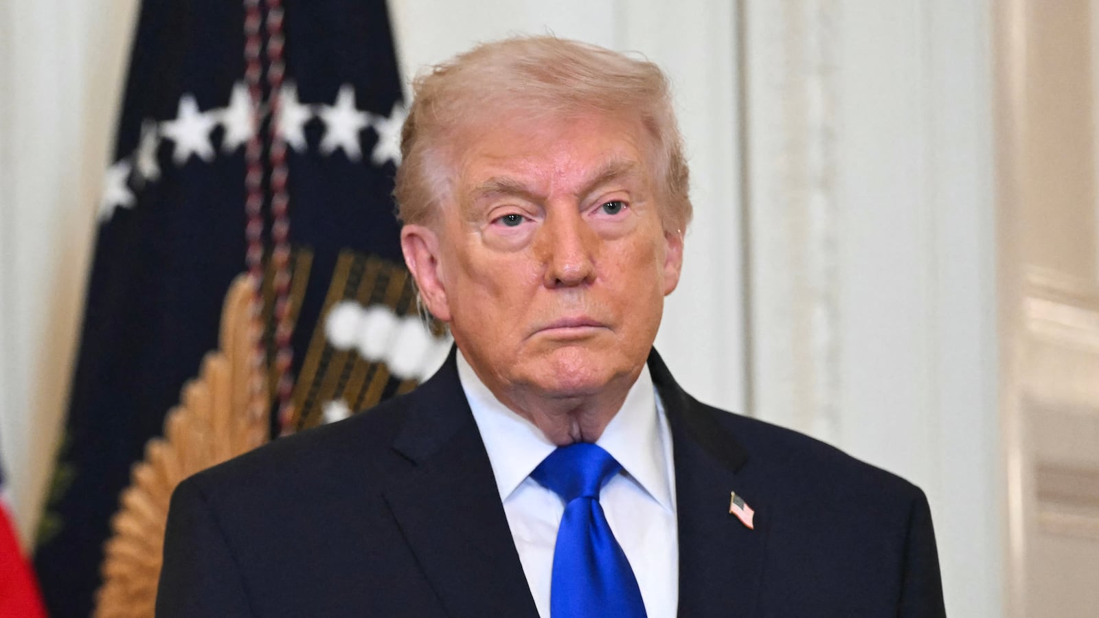 US President Donald Trump looks on during the Angel Families Remembrance Ceremony in the East Room of the White House in Washington, DC, on February 23, 2026. (Photo by SAUL LOEB / AFP via Getty Images)
