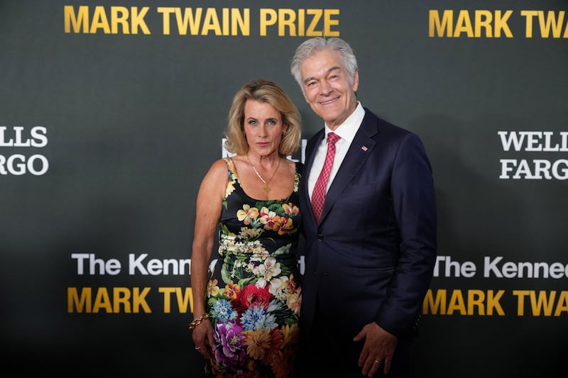 Administrator of the US Centers for Medicare and Medicaid Services Dr Mehmet Oz and his wife Lisa Oz pose on the red carpet, on the day comedian Bill Maher receives the Mark Twain Prize for American Humor at the Kennedy Center, in Washington, D.C., U.S., June 28, 2026.