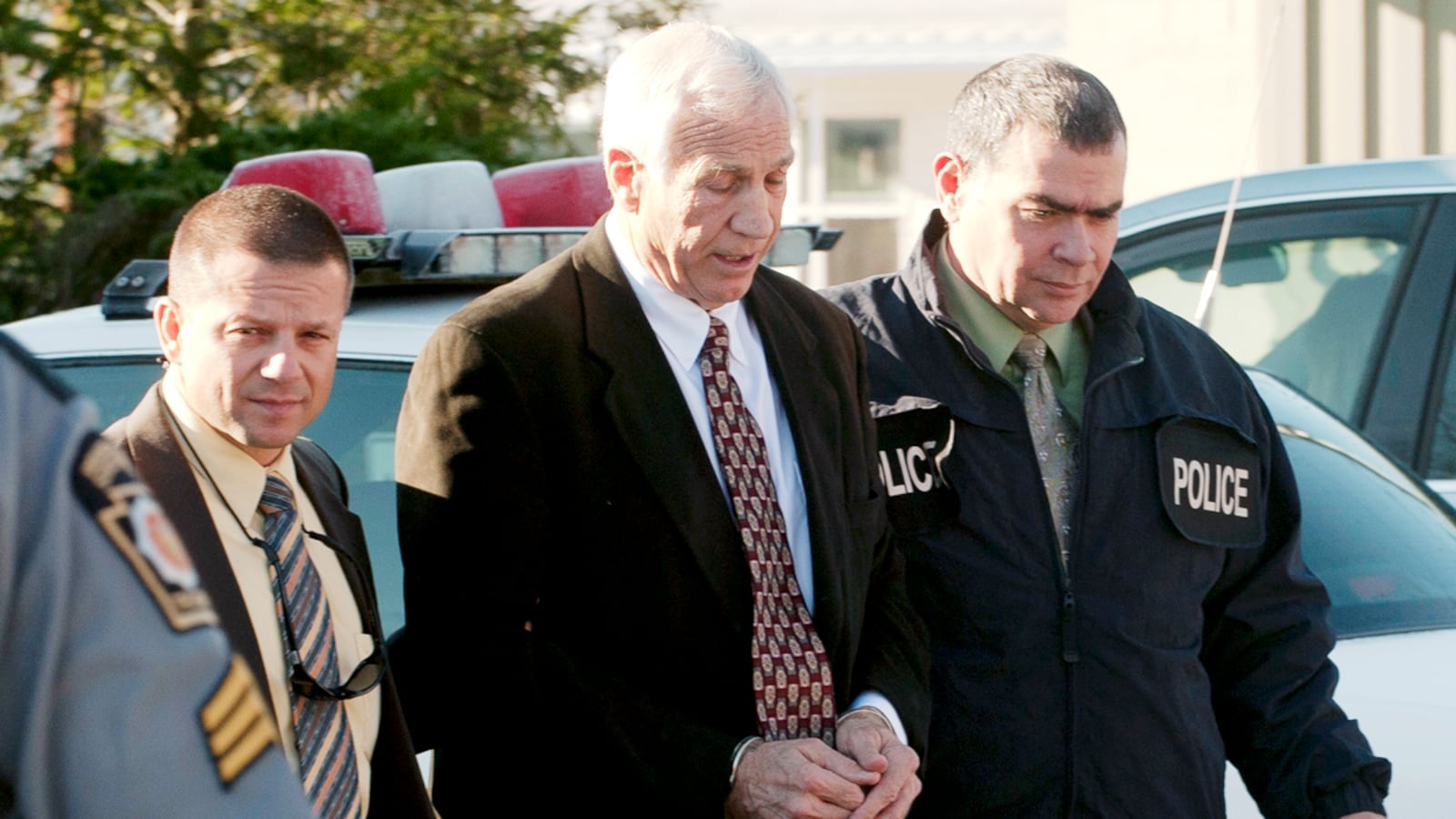 articles/2011/11/16/penn-state-scandal-the-grand-jury-report-vs-sandusky-s-claims/jerry-sandusky-coach-arrested-cs_lyhjko