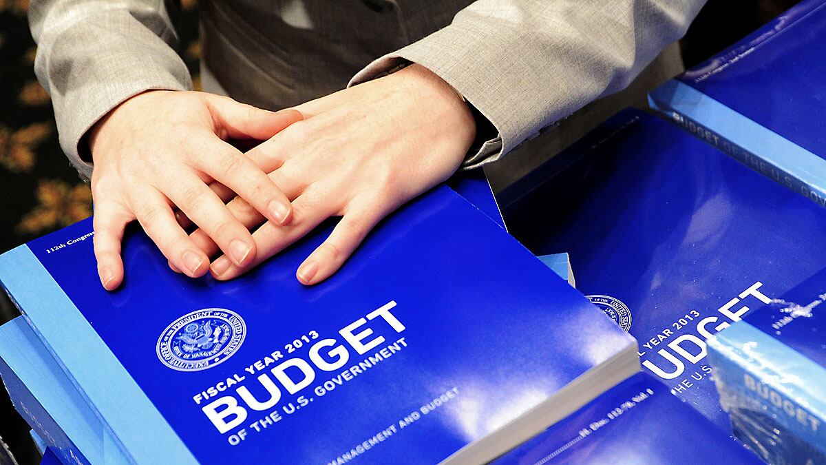 articles/2012/02/13/obama-s-2013-budget-perfectly-reasonable-absolutely-terrible/obama-budget-book-cheat_j5dmx8