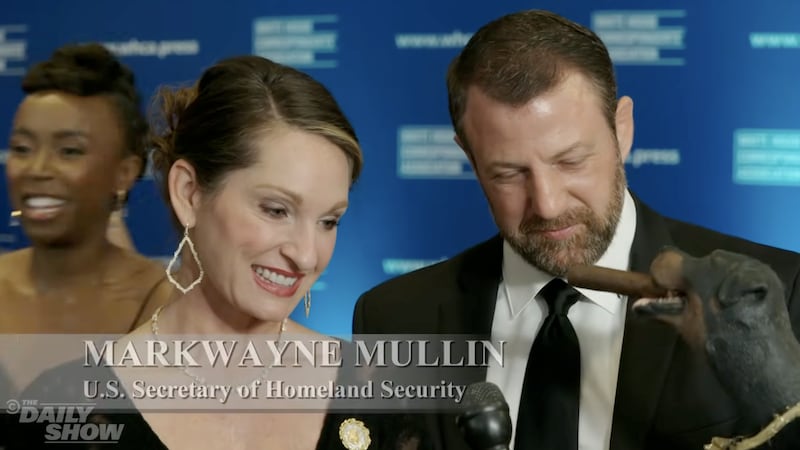 Markwayne Mullin, his wife, and Triumph the Insult Comic Dog.