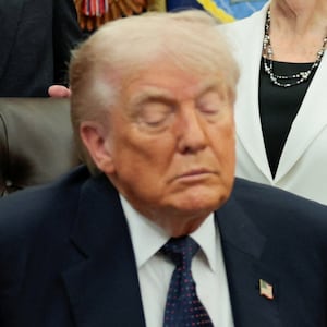 Youth listens to Human Services (HHS) Secretary Robert F. Kennedy Jr speaking, next to U.S. President Donald Trump, U.S. Department of Housing and Urban Development Secretary Scott Turner,  U.S. Education Secretary Linda McMahon and U.S. Secretary of Defense Pete Hegseth during a memorandum signing event in the Oval Office at the White House in Washington, D.C., U.S., May 5, 2026. REUTERS/Evan Vucci