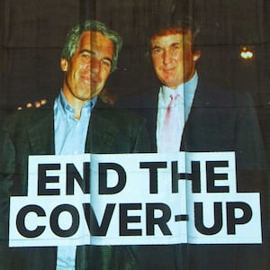 A photo of late financier and convicted sex offender Jeffrey Epstein and U.S. President Donald Trump is projected onto the Washington Hilton in Washington, D.C., U.S., April 24, 2026. REUTERS/Aaron Schwartz