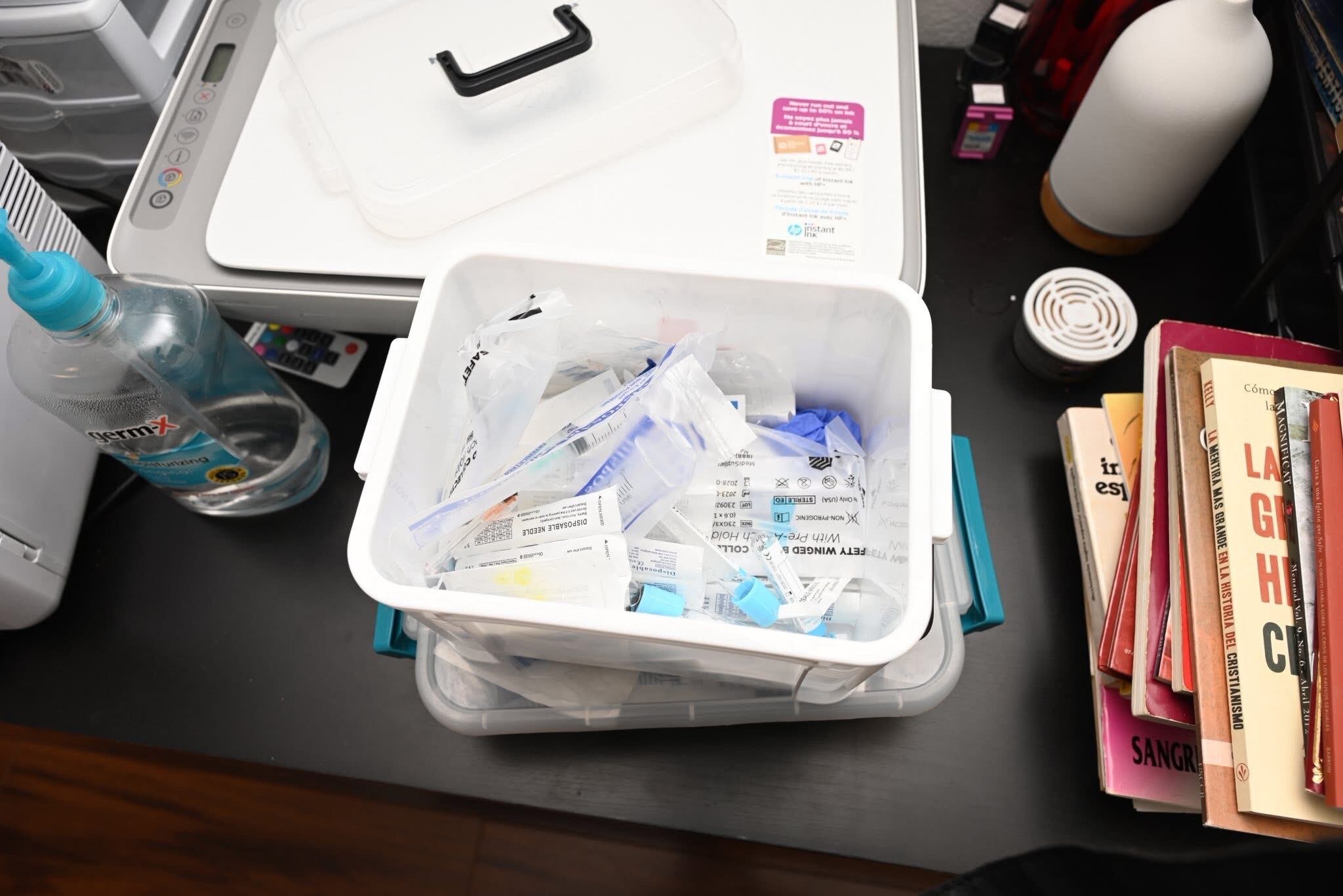 A now-seized plastic container of medical supplies from an unlicensed facility.