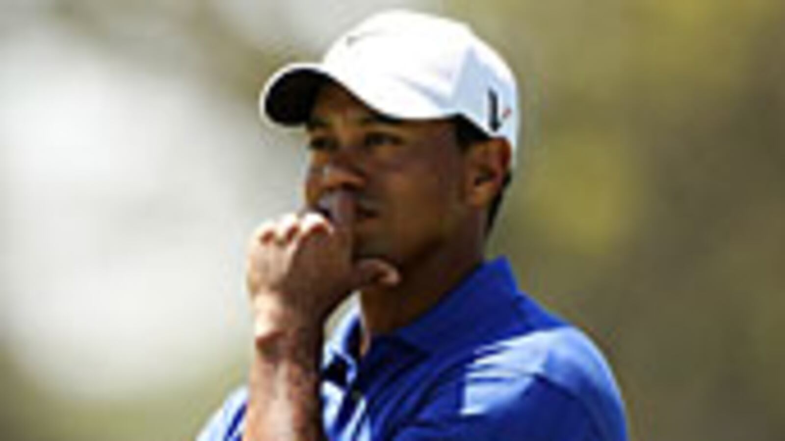 articles/2009/12/02/tigers-ferocious-drive/depaulo-tiger-woods_66536_alnqis