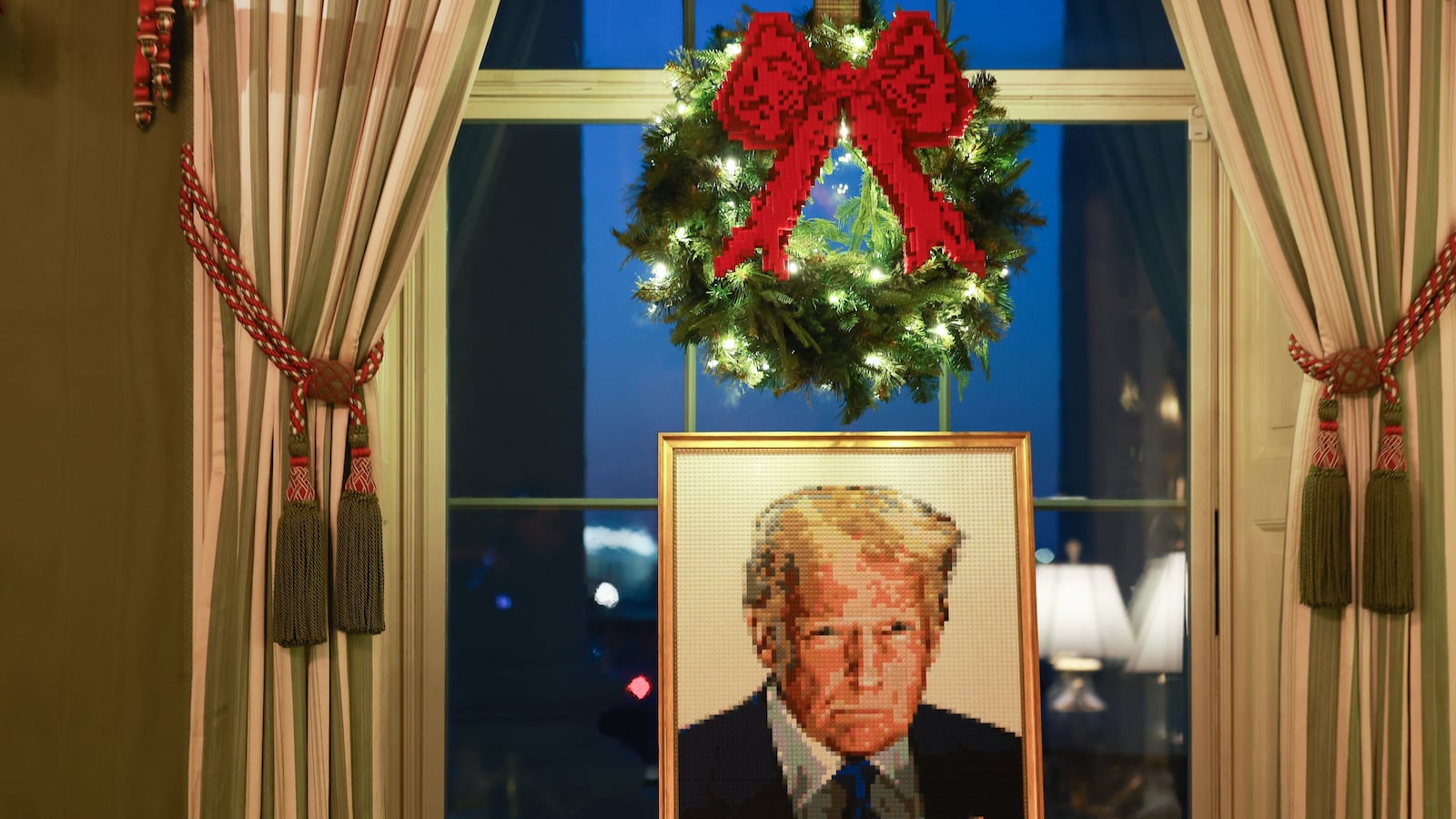 A lego portrait of U.S. President Donald Trump is seen in the Green Room during an advance tour of the 2025 White House Christmas decorations on December 01, 2025 in Washington, DC. The theme for this year's White House Christmas decorations is "Home Is Where The Heart Is."